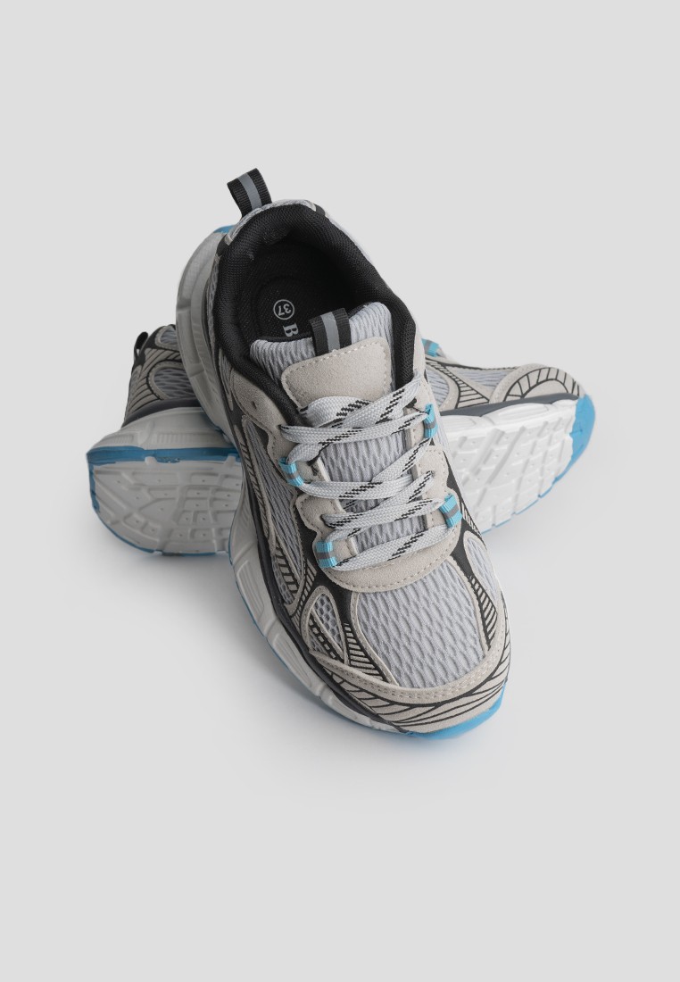 Кросівки жіночі